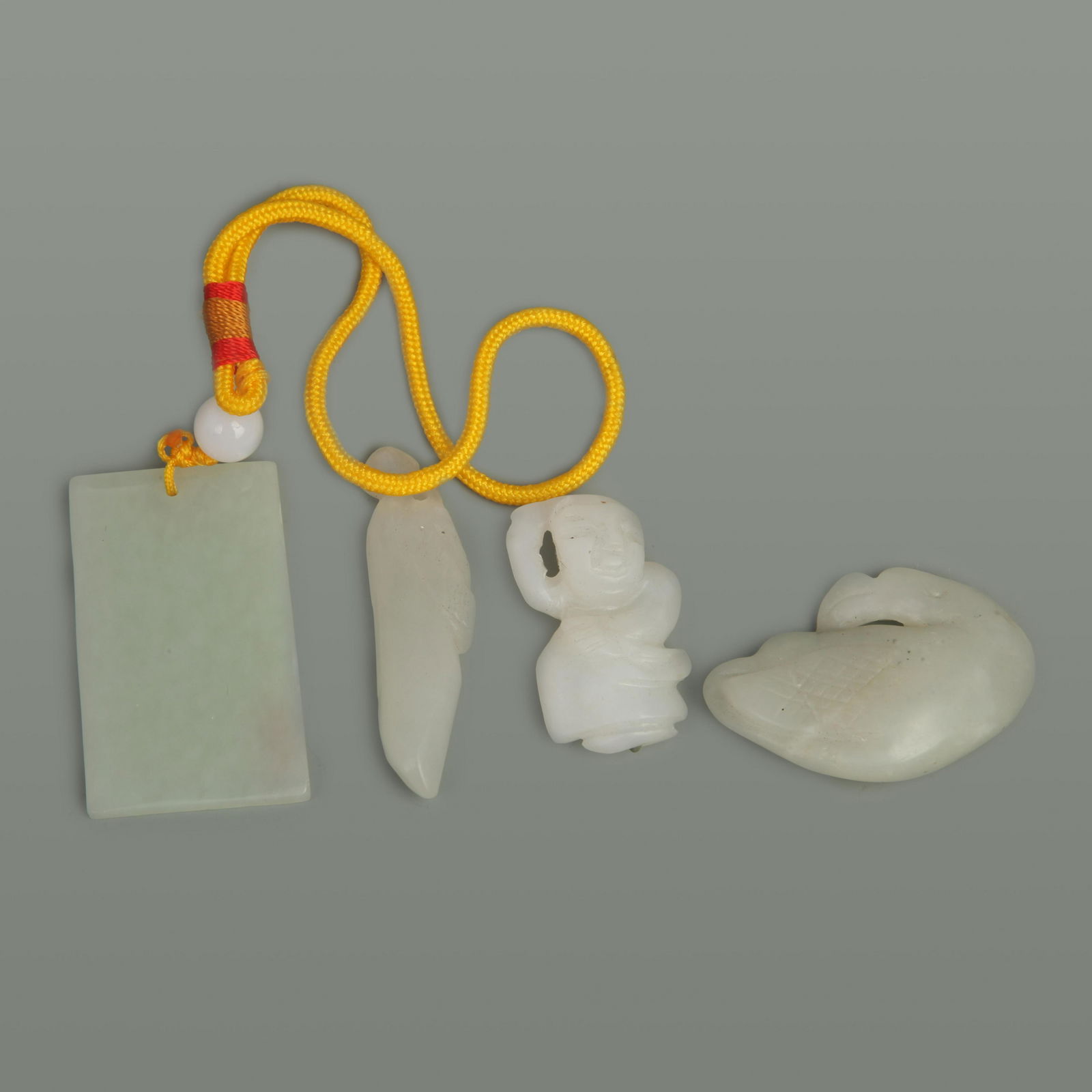 GROUP OF FOUR JADE PENDANT (1 of 14)