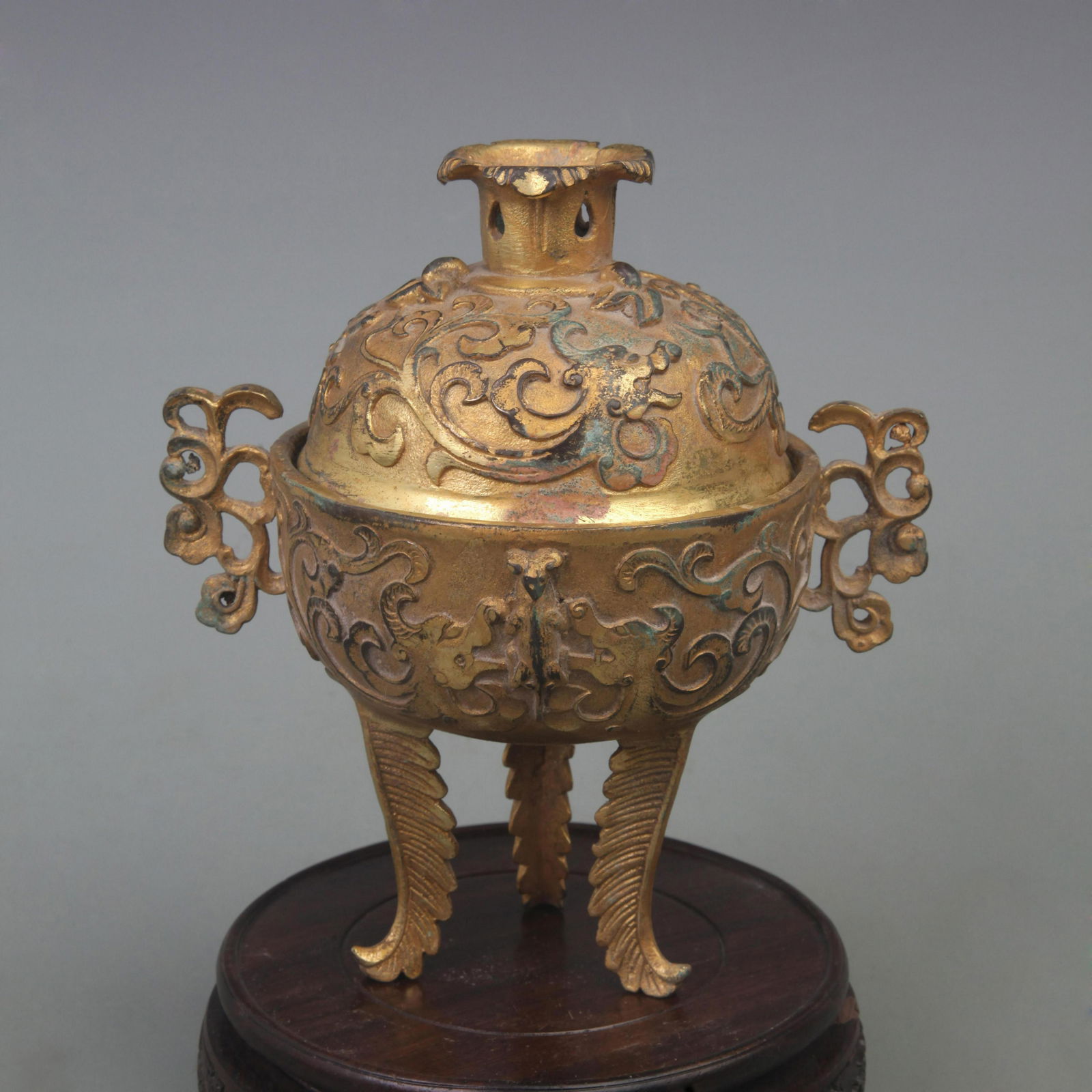 A GILT BRONZE DRAGON PATTERN THREE FOOT INCENSE BURNER (1 of 5)