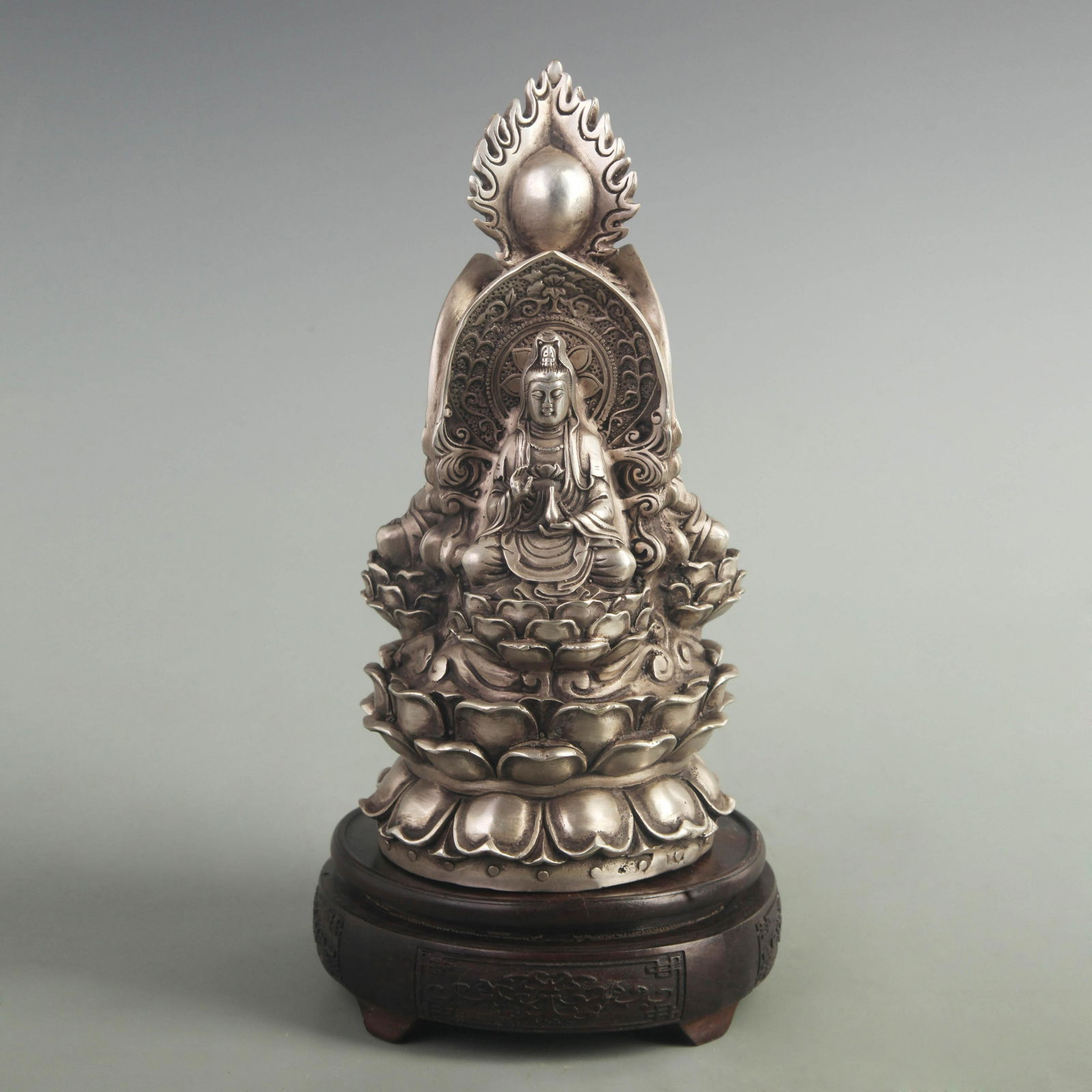 A SILVER GILT BRONZE THREE FACE GAUTAMA BUDDHA STATUE (1 of 5)