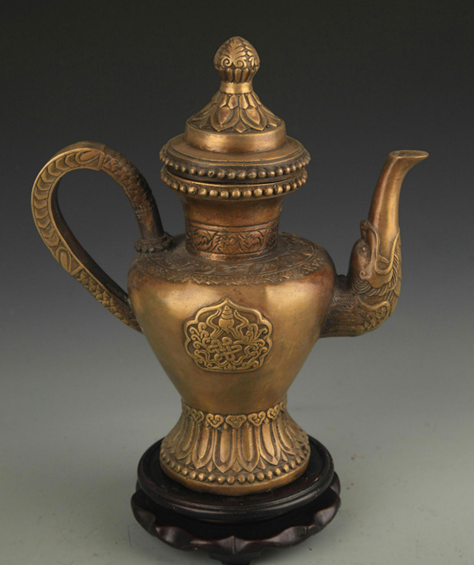 A FINE TIBETAN BUDDHIST FINELY CARVED BRONZE EWER (1 of 6)