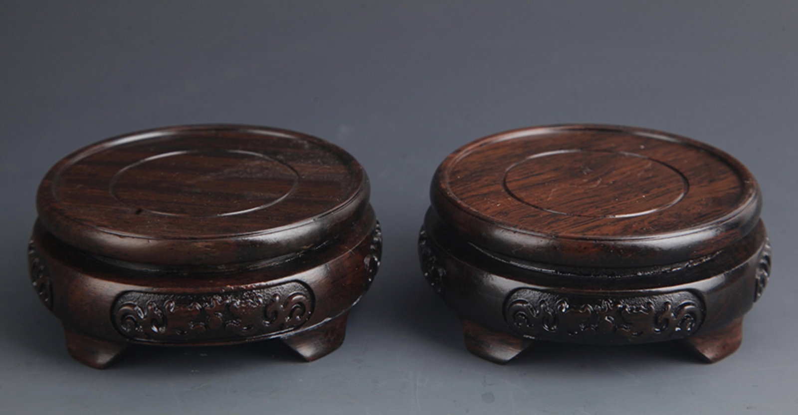 PAIR OF FINELY CARVED HUA LI MU WOODEN BASE: 20th Century, High: 1.5 inch; Diameter: 3.25 inch