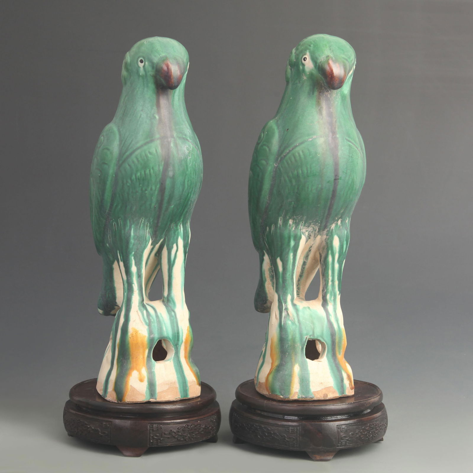 A PAIR OF LARGE GREEN GLAZED PARROT PORCELAIN ORNAMENTS (1 of 10)