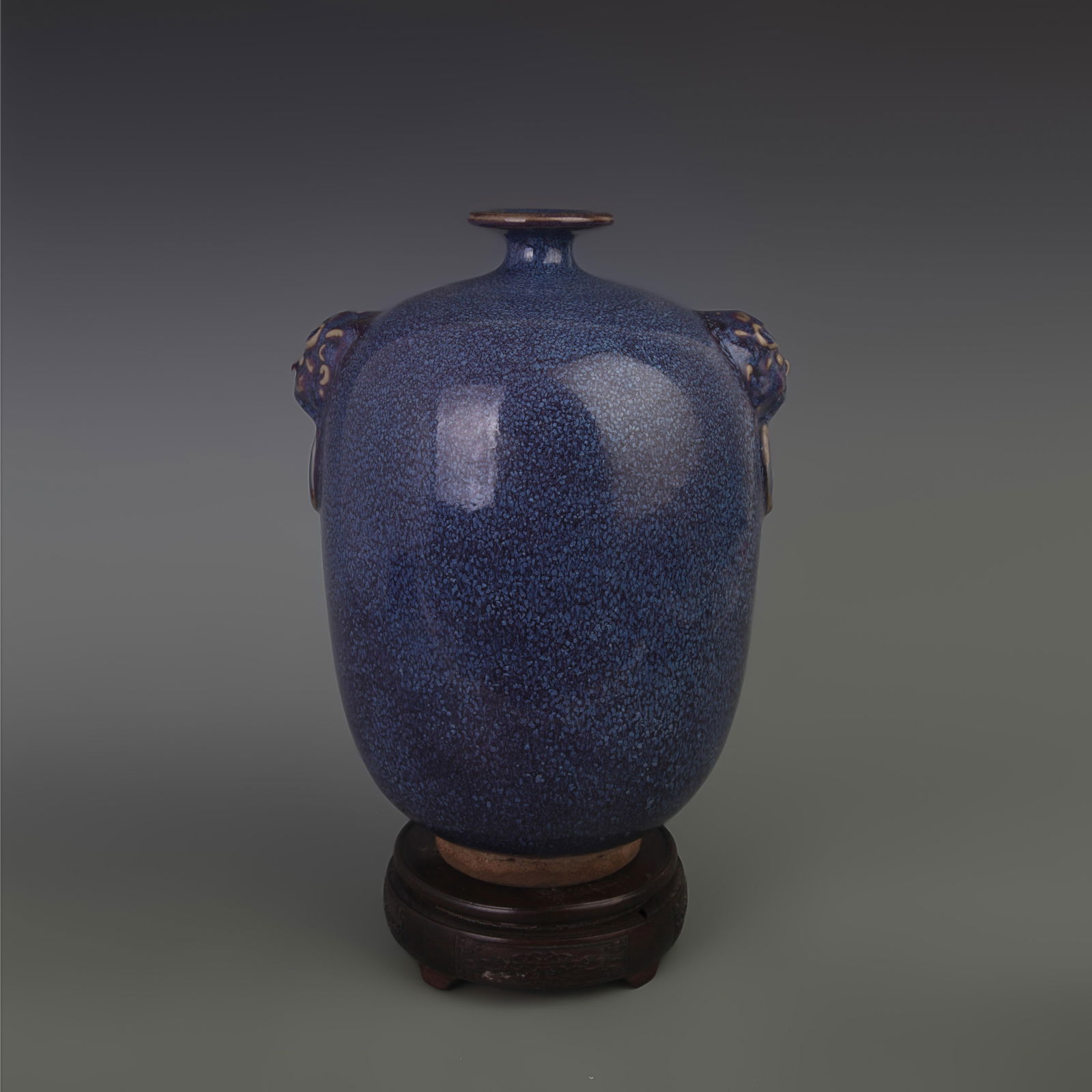 A LU JUN KILN ANIMAL HANDLE PATTERN PORCELAIN BOTTLE: Qing Dynasty, Diameter: 7.8 inch; High: 11.3 inch