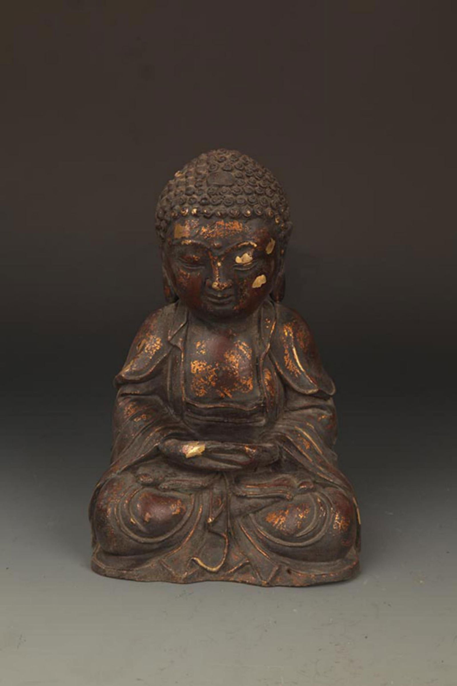 A FINELY CARVED CAST IRON TATHAGATA BUDDHA FIGURE (1 of 6)