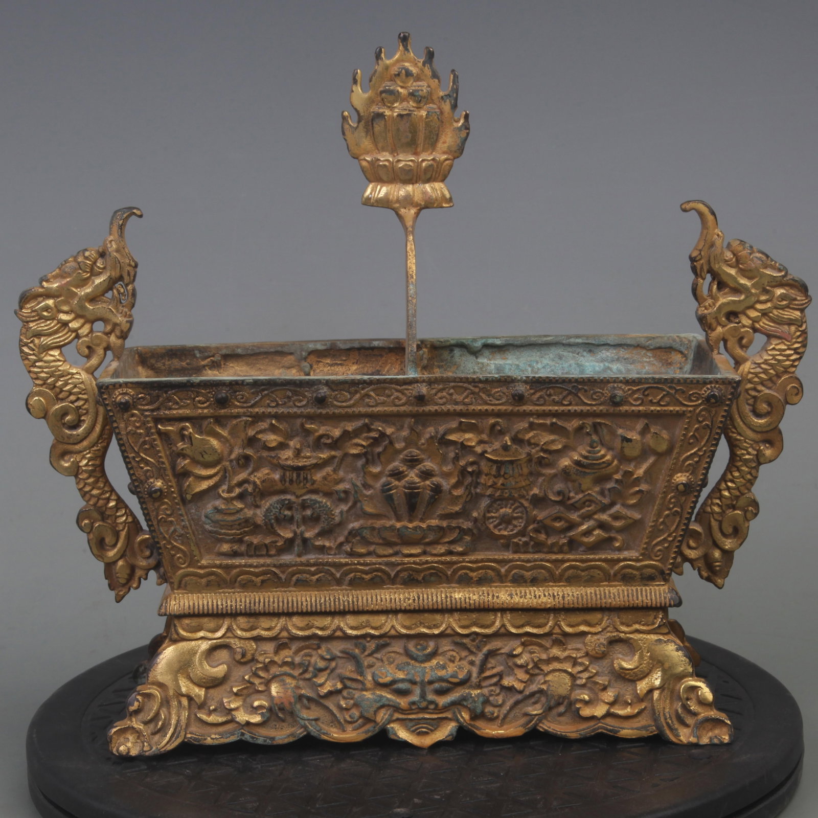 GILT BRONZE INCENSE BURNER WITH DRAGON EARS AND EIGHT TREASURES: Qing Dynasty; Long: 9.3 inch; Width: 3.3 inch; High: 8.1 inch