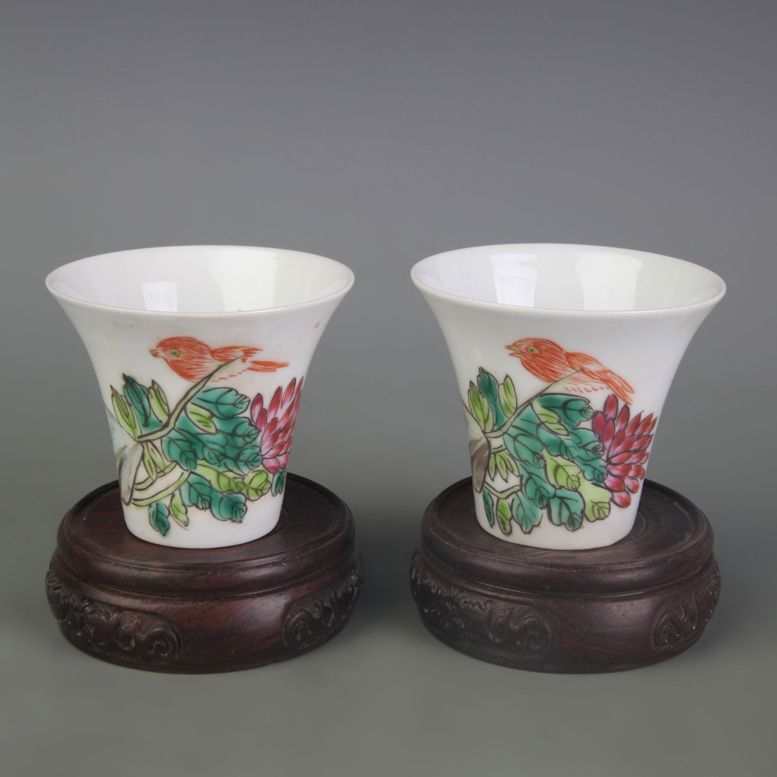 PAIR OF FAMILLE ROSE FLORAL AND BIRD PATTERN TEA CUPS: Qing Dynasty Guang Xu Period; Diameter: 2.9 inch; High: 2.5 inch