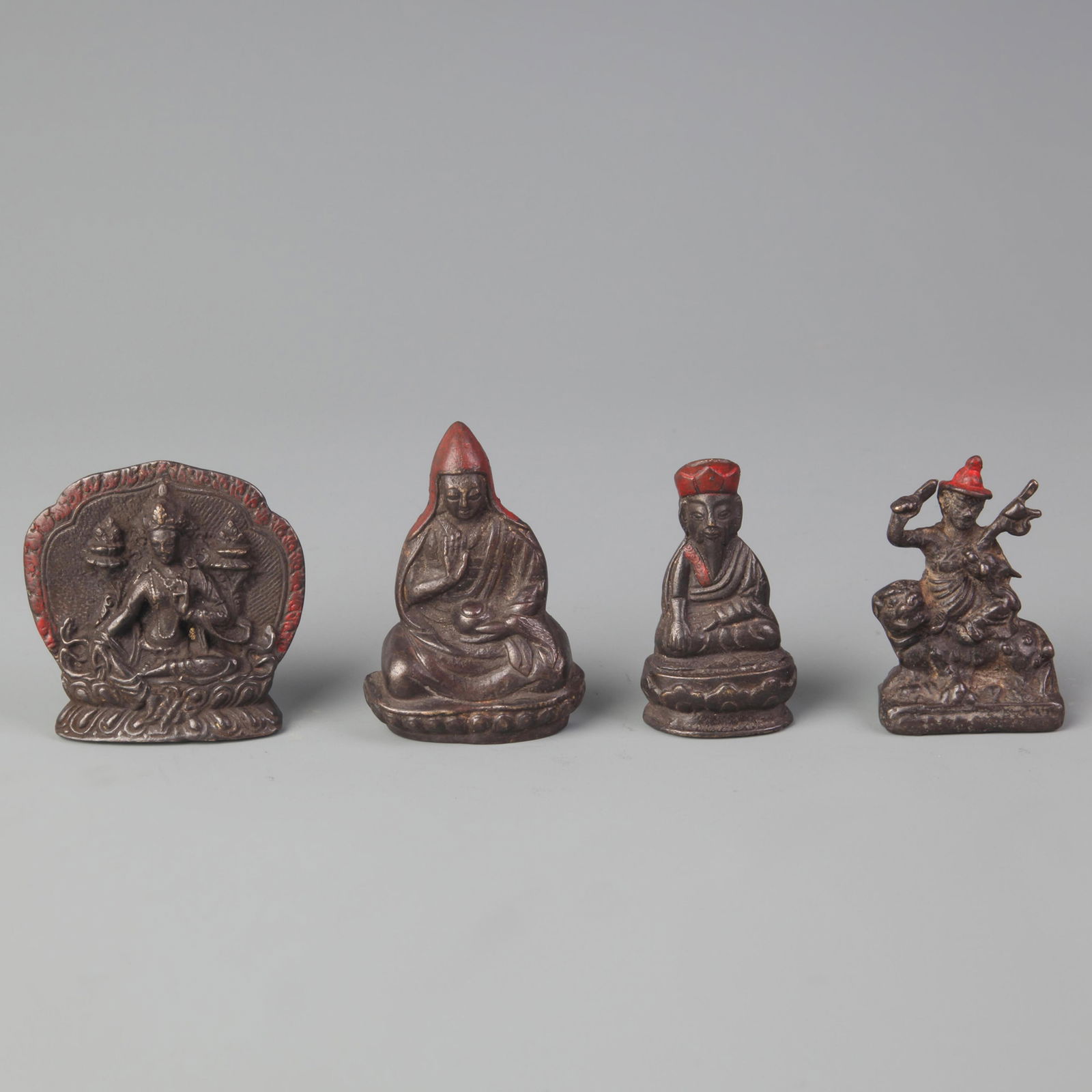 GROUP OF THREE SMALL BRONZE TIBETAN PENDANT (1 of 7)