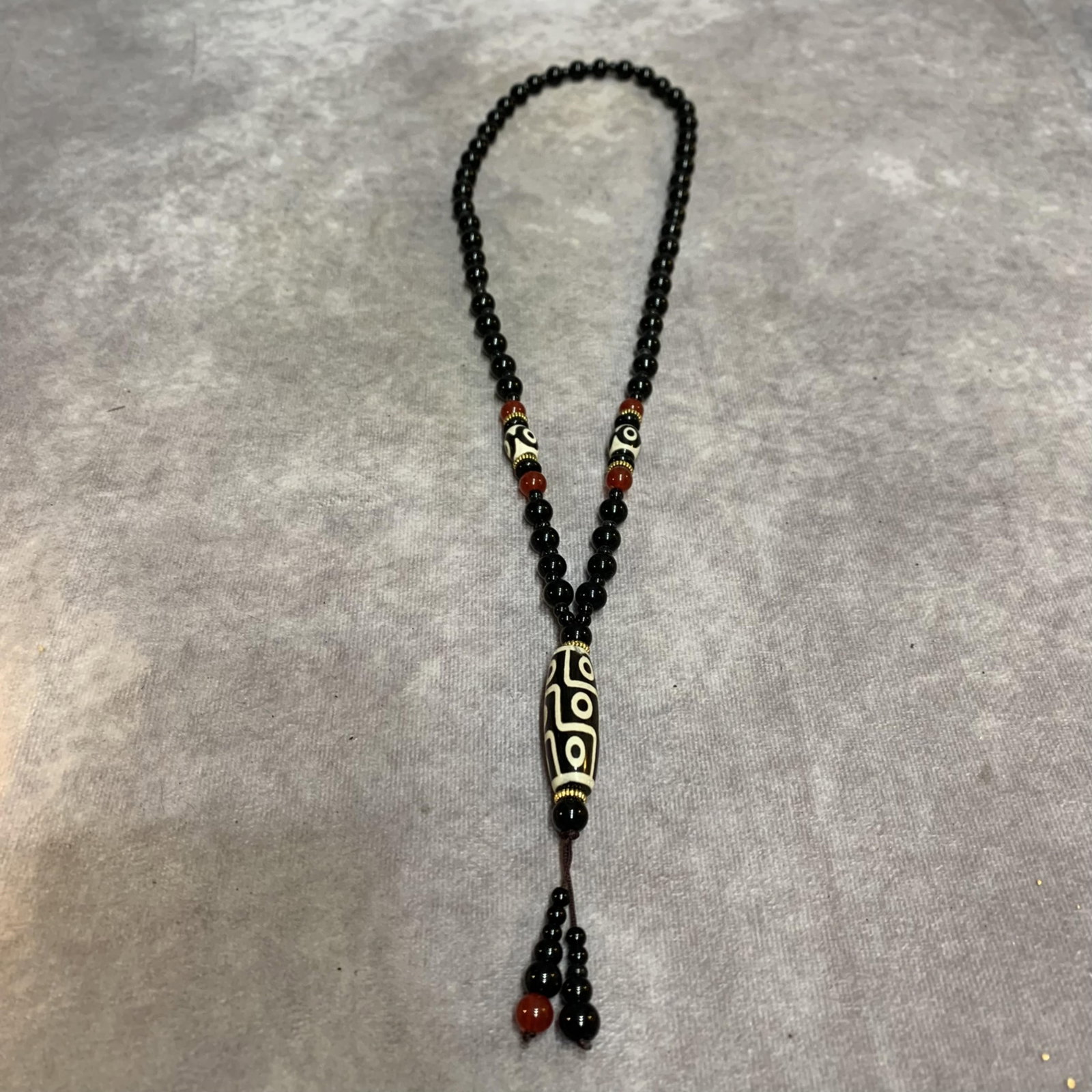 A FINE NINE EYE TIANZHU NECKLACE: Modern, Long: 16.0 inch