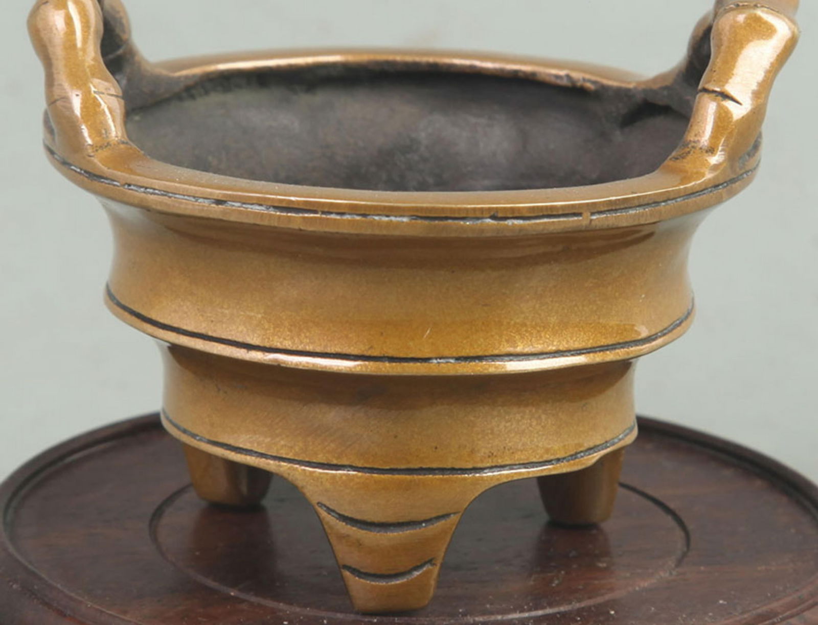 A FINE BAMBOO EAR THREE-LEGGED BRONZE CENSER (1 of 4)