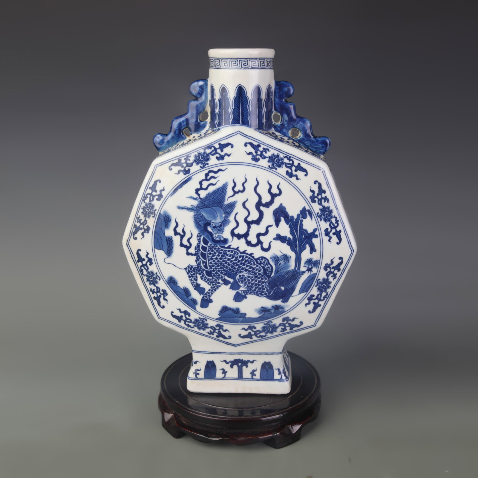 84. BLUE AND WHITE AUSPICIOUS BEAST OPEN-WORK MOON FLASK: Qing Dynasty; Width: 9.2 inch; High: 13.6 inch