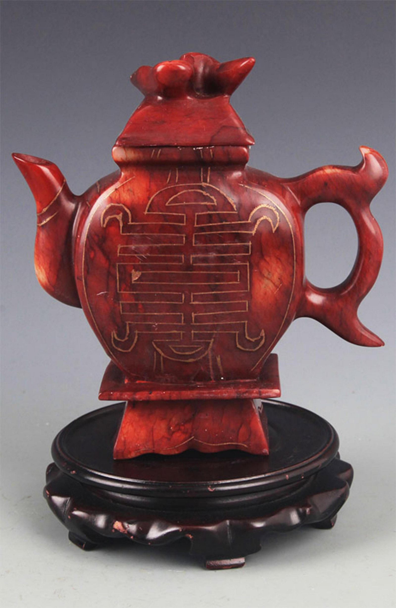 A FINELY CARVED EWER WITH GOLD-PAINTED LONGEVITY CHARACTER PATTERN: 20th Century; High: 7.0 inch; Diameter: 6.5 inch;