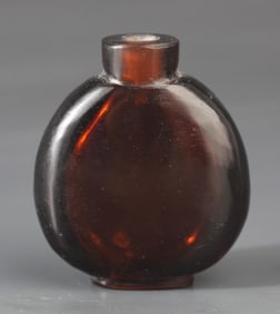 A FINE GLASS MADE SNUFF BOTTLE