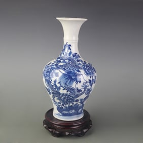 BLUE AND WHITE PORCELAIN VASE WITH FLOWER AND DRAGON PATTERNS