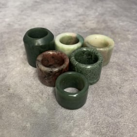 GROUP OF JADE THUMB RING
