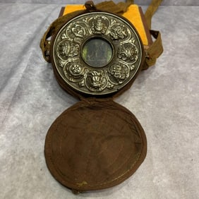 A FINE TIBETAN BUDDHIST GAWU PENDANT