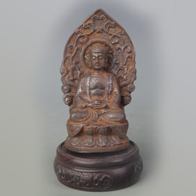 A FINE CAST IRON SHAKYAMUNI BUDDHA