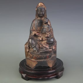 A FINE BRONZE FERTILITY GUANYIN STATUE