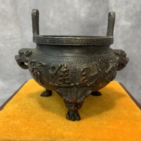 A FINE BRONZE ANIMAL HANDLE THREE FOOT CENSER