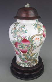 RARE FAMILLE ROSE FU AND SHOU DESIGN PORCELAIN GENERAL JAR (REDWOOD LID, WHITE JADE KNOB)