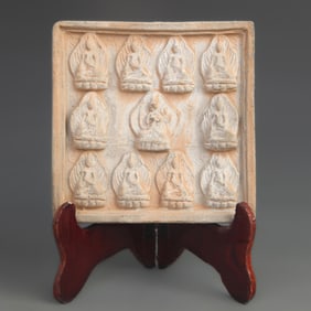 CERAMIC TILE CARVING OF A SCULPTURE OF BUDDHA