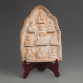 CERAMIC TILE CARVING OF A SCULPTURE OF SHAKYAMUNI BUDDHA