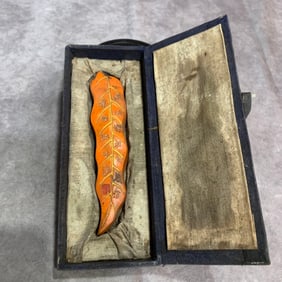 A FINELY CARVED CINNABAR INK WITH BOX