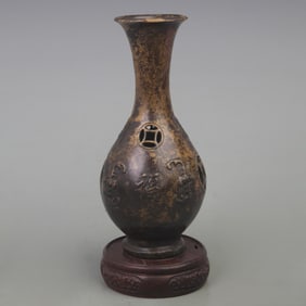 A FINE BRONZE FLOWER PATTERN BOTTLE