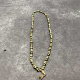 A FINE PUTI SEED NECKLACE