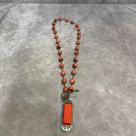 A FINE RED CORAL MADE NECKLACE