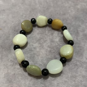 A FINE JADE MADE BRACELETS