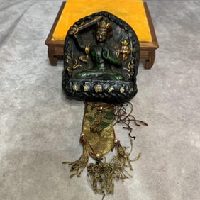 A FINE TIBETAN BUDDHIST RITUAL PENDANT