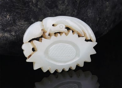 A FINE PHOENIX PATTERN PALE CELADON JADE PENDANT