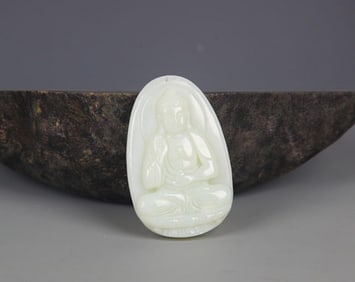 A FINELY CARVED HETIAN PALE CELADON JADE PENDANT PENDANT