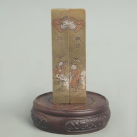 SET OF BRONZE PAPER WITH SILVER INLAID DESIGN