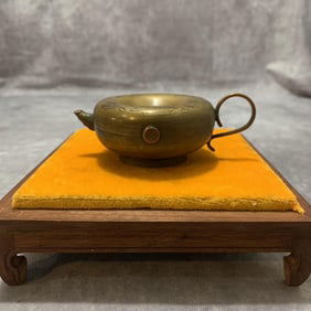 A FINELY CARVED BRONZE WATER JAR