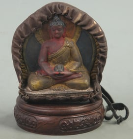 A SMALL BRONZE TIBETAN BUDDHISM PENDANT