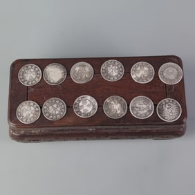 GROUP OF TWELVE SMALL OLD CHINESE COIN