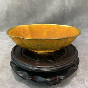 A SMALL FINELY CARVED BRONZE GILT BOWL