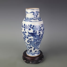 BLUE AND WHITE PORCELAIN VASE WITH FLORAL AND DRAGON PATTERNS