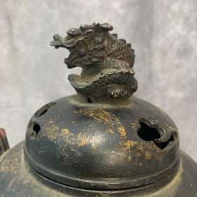 A FINE ROUND LION TOP BRONZE CENSER