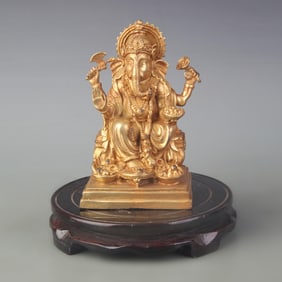 A FINE BRONZE WEALTH GOD STATUE