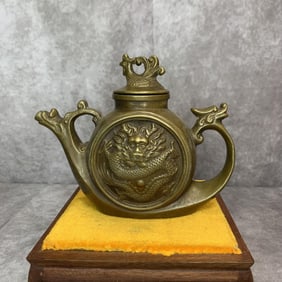 A FINE DRAGON PATTERN BRONZE WATER EWER