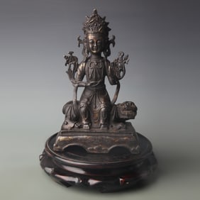 A FINE BRONZE SEATED GUANYIN STATUE