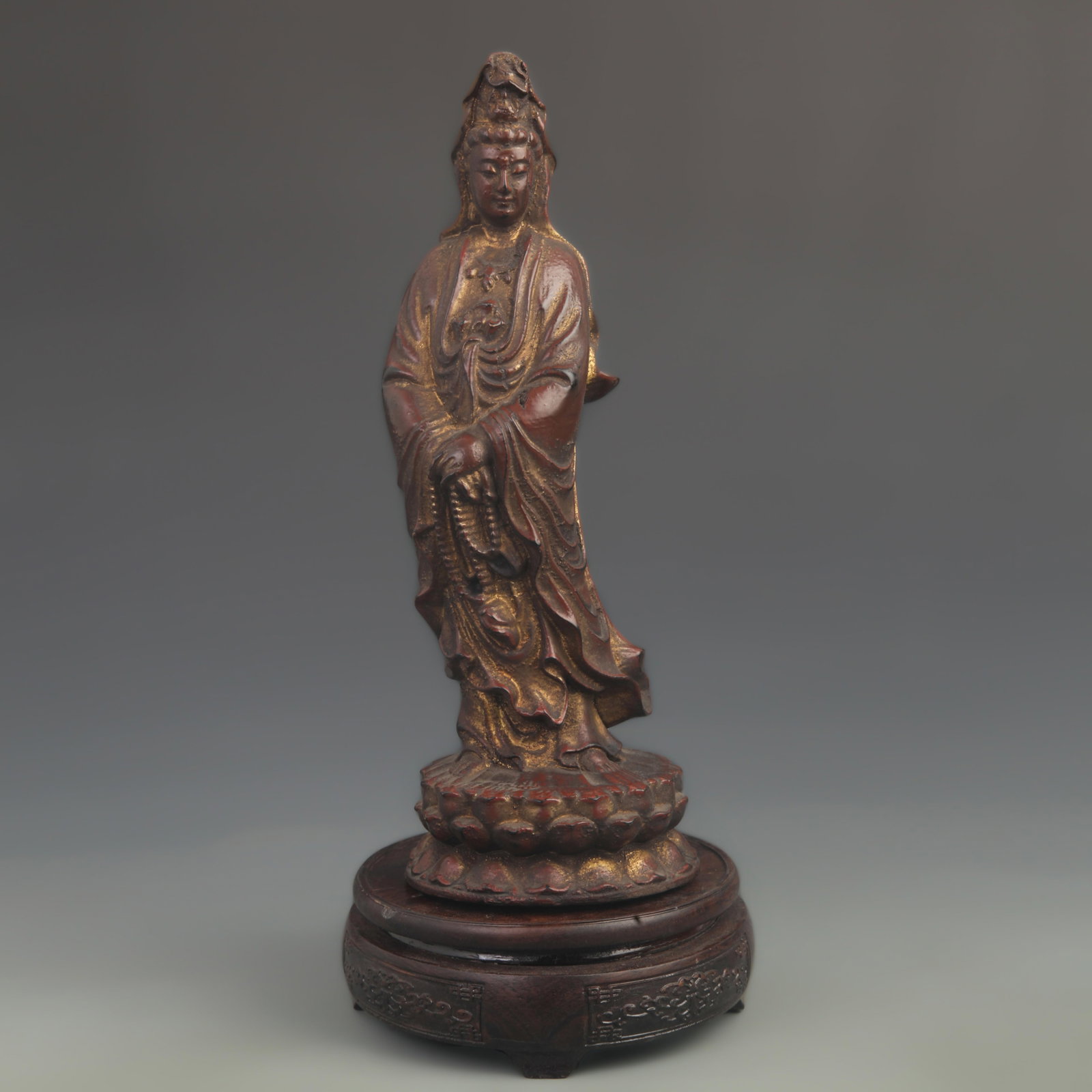 WOODEN LACQUER AND GOLD STATUE OF GUANYIN: 20th Century; High: 11.25 inch; Width: 2.75 inch;