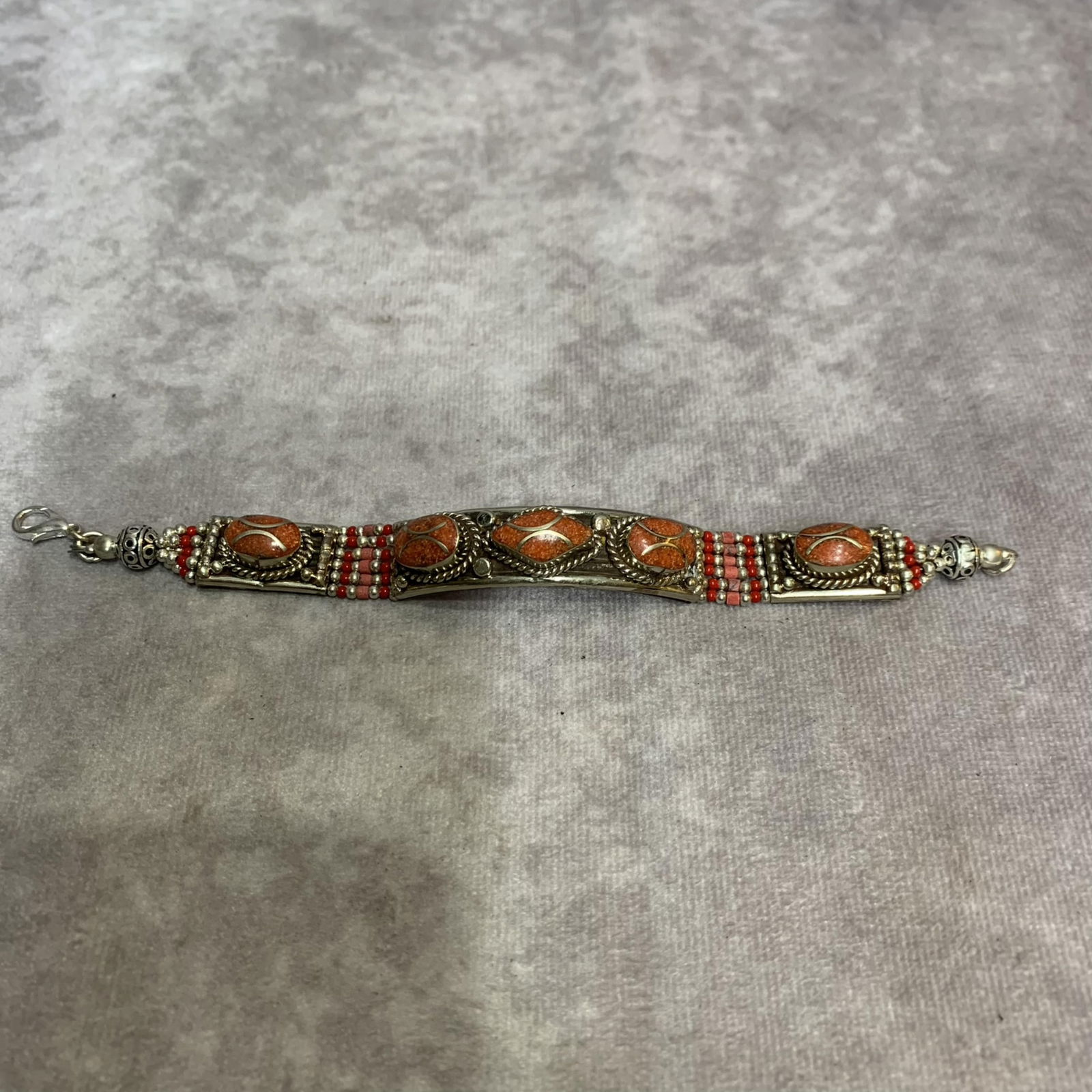 A FINE WHITE BRONZE WITH GEM STONE BANGLE (1 of 3)