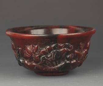 A FINELY CARVED CUP