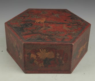 A GILT LACQUER FLOWER PAINTED HEXAGONAL BOX