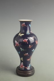 FAMILLE ROSE ORCHID GROUND VASE WITH A HUNDRED BUTTERFLIES