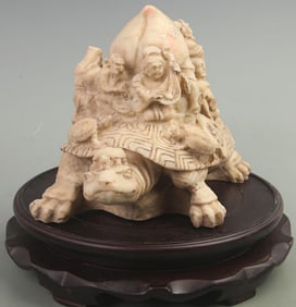 A FINE GLASS MADE TURTLE WITH THE EIGHT IMMORTALS