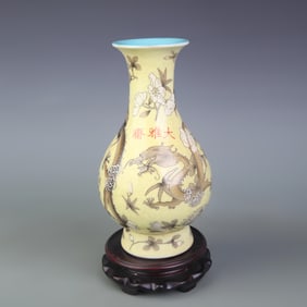 FAMILLE ROSE YELLOW-GROUND FLORAL DRAGON-PATTERNED PORCELAIN VASE